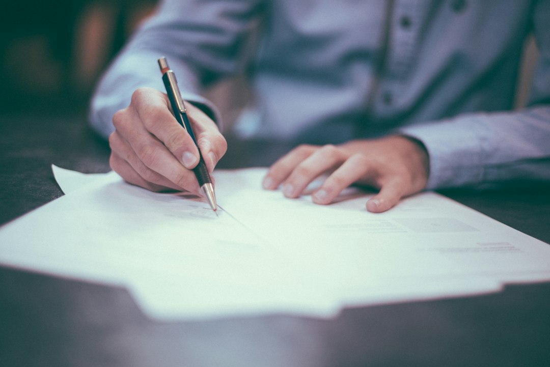 Person reviewing insurance paperwork