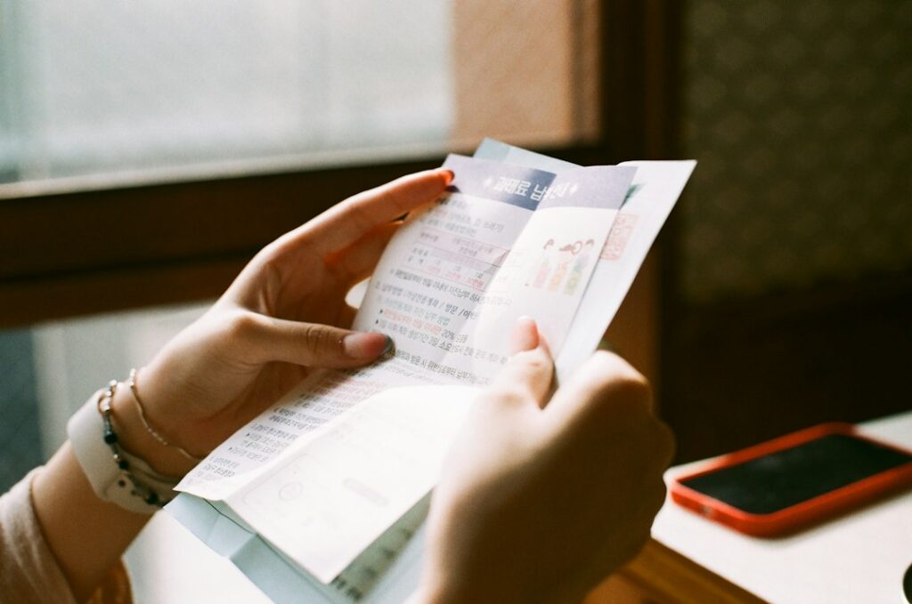 Person reviewing medical bill paperwork