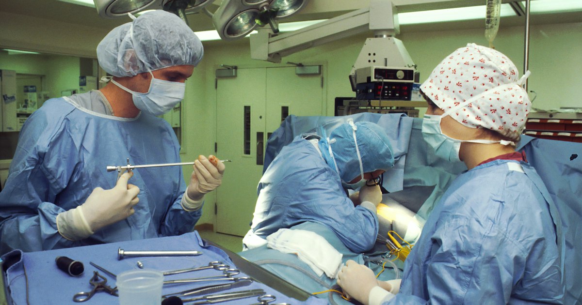 Healthcare workers in scrubs taking a break